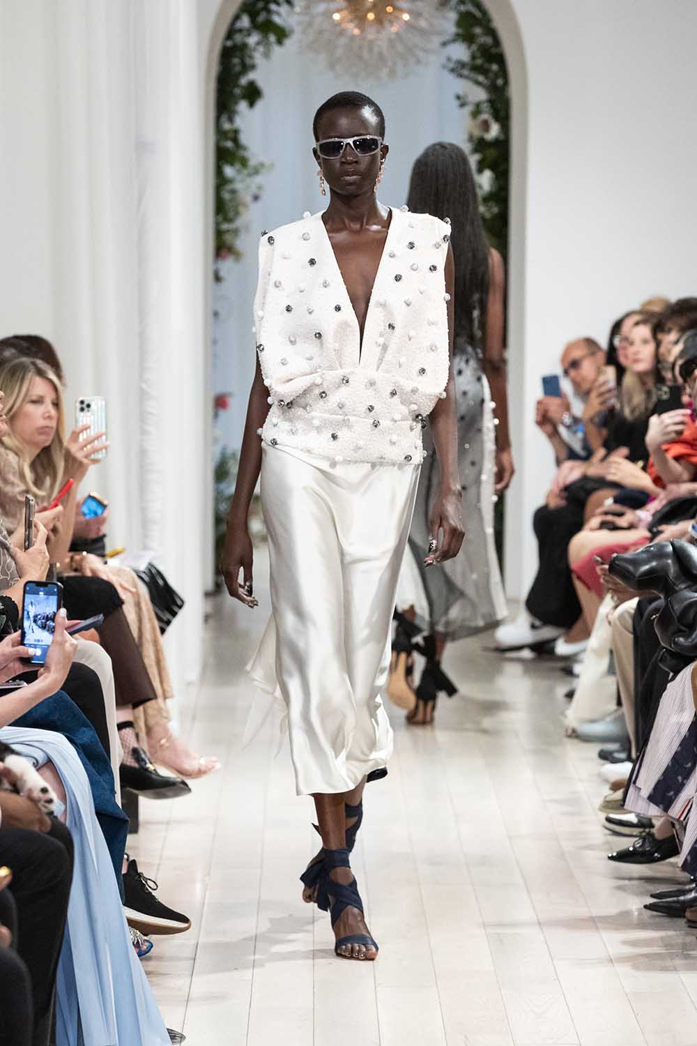 Runway model wearing Bibhu 03 silver plasma sunglasses