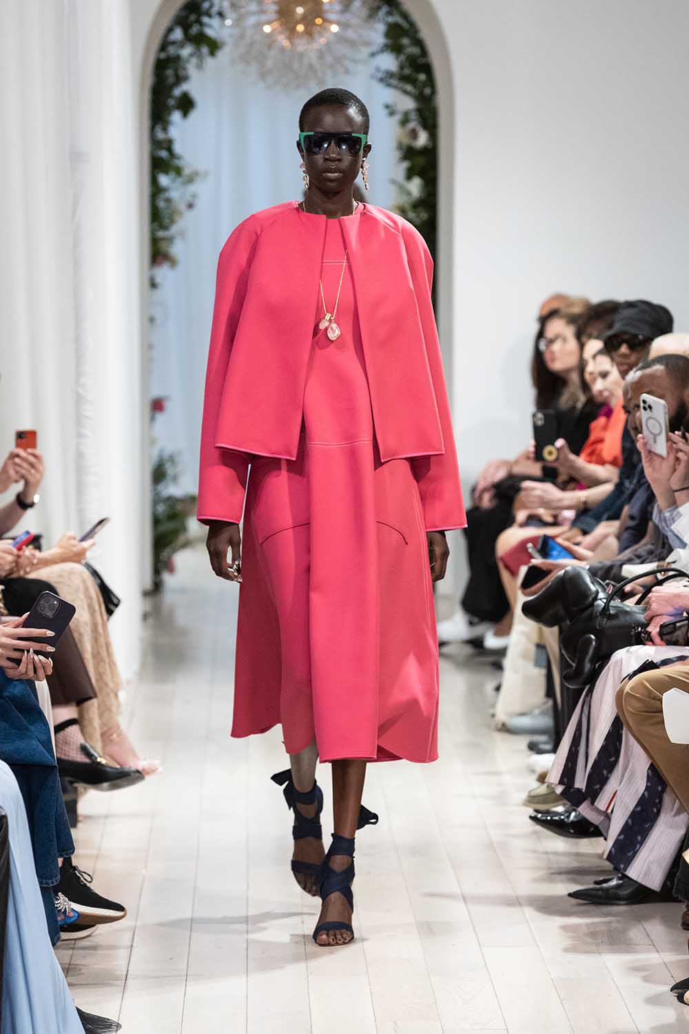 Runway model wearing Bibhu 01 green and black sunglasses