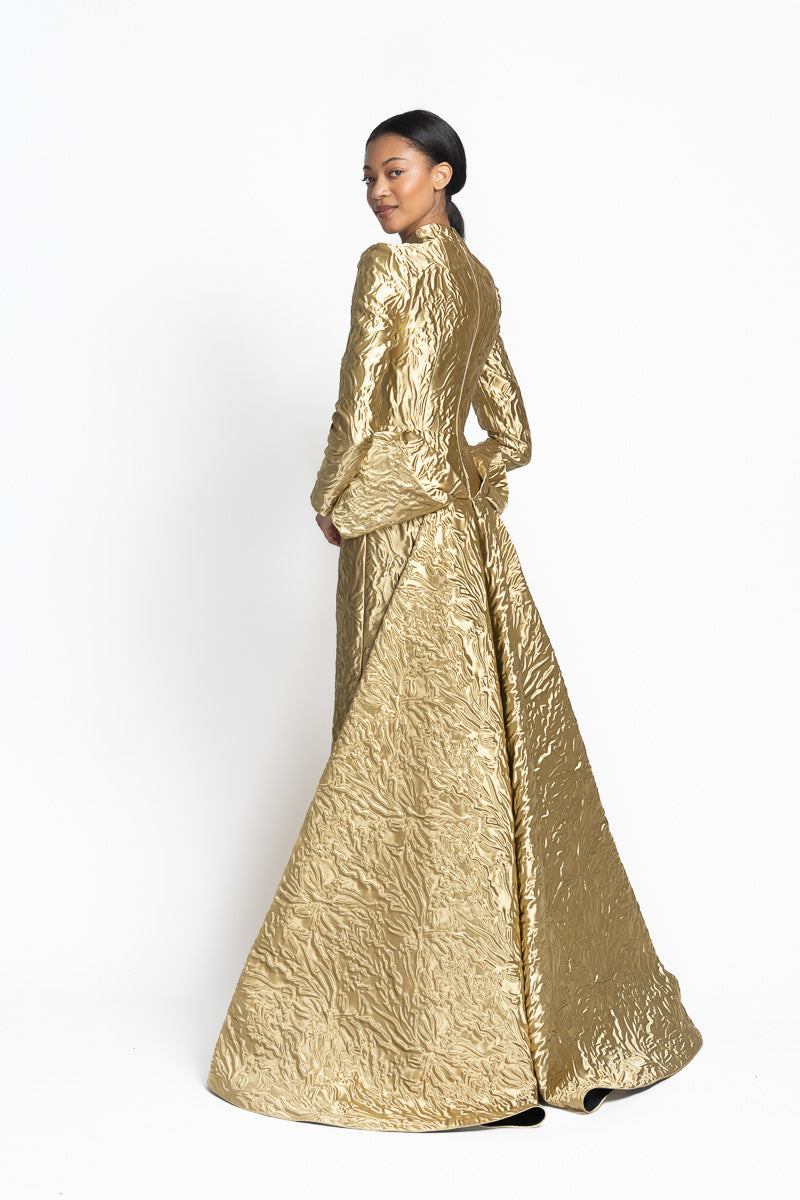 Hema Embossed Gold Jacquard Goddess Gown with Iris Drape Side Two