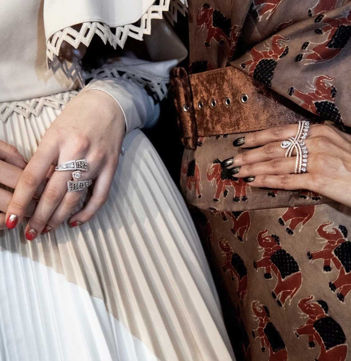 two women wearing forevermark rings